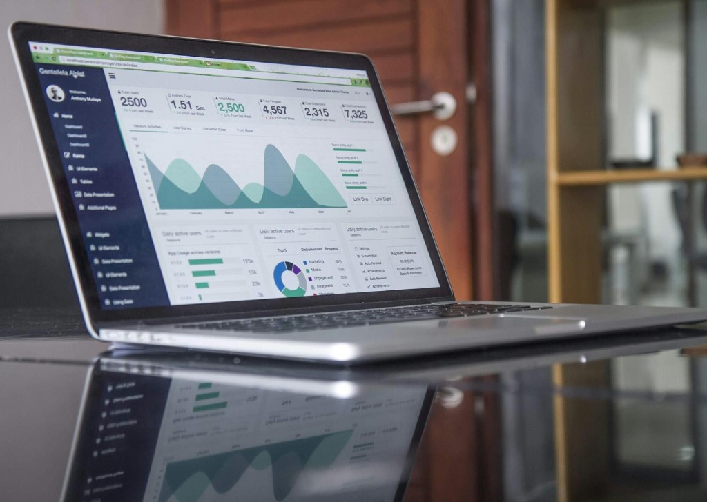 FundingExpressAi dashboard on laptop — clear funding insights for your business